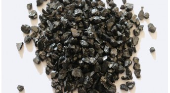 What are the raw materials used to produce graphite electrodes?